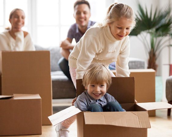 Kids playing with boxes